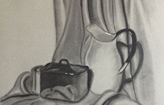 Charcoal drawing showing a vase, tin, and drapery.